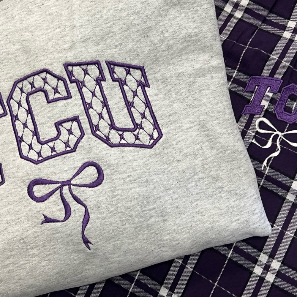 Embroidered TCU sweatshirt coquette